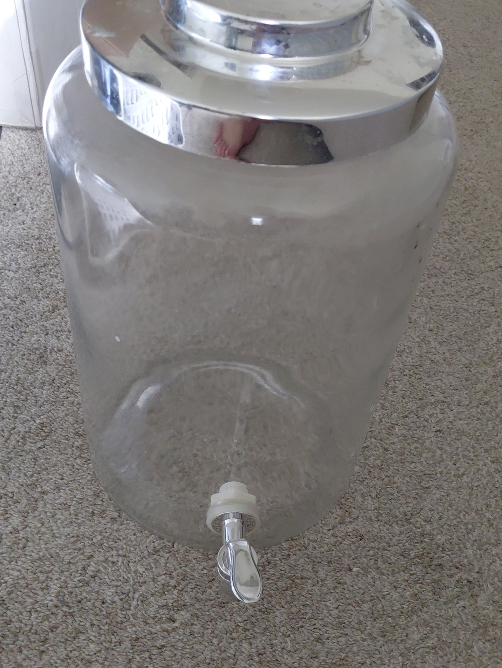 Clear Glass Beverage Dispenser with Silver Lid and Spigot